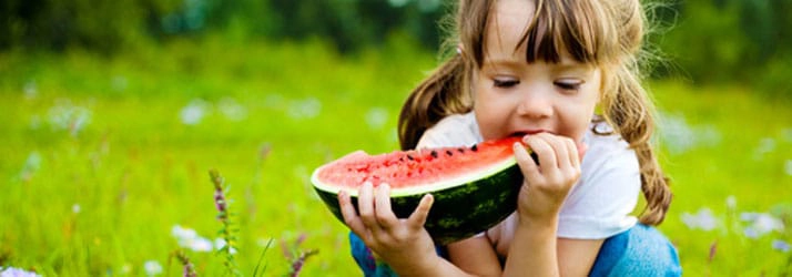 Chiropractic Lafayette LA Girl Eating Watermelon